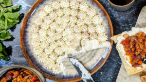 plate of whipped feta with eggplant topping